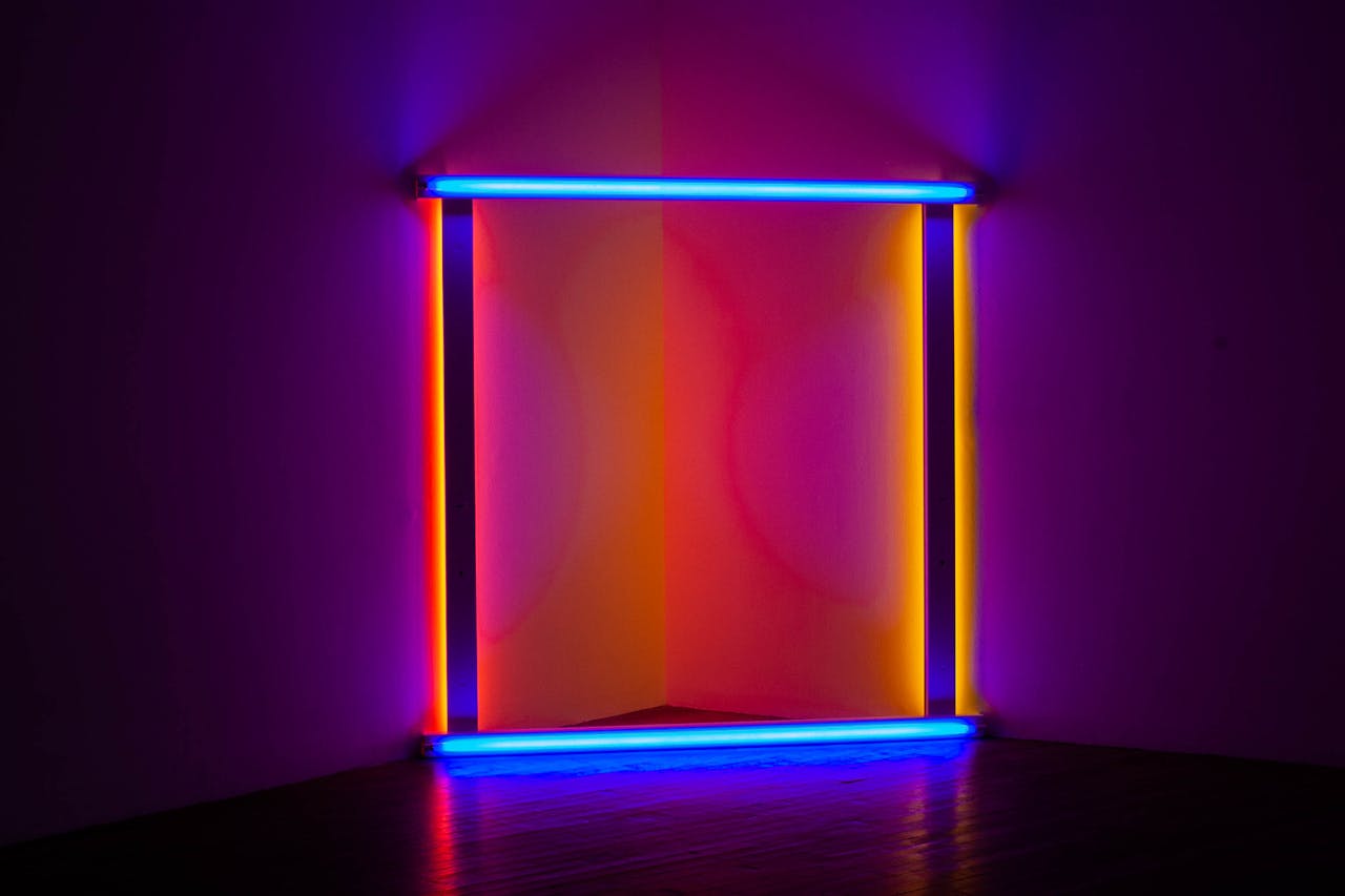 Mastering the First Impression: Your intriguing post title goes here Colorful neon light installation creating a modern abstract art piece in an indoor gallery setting.
